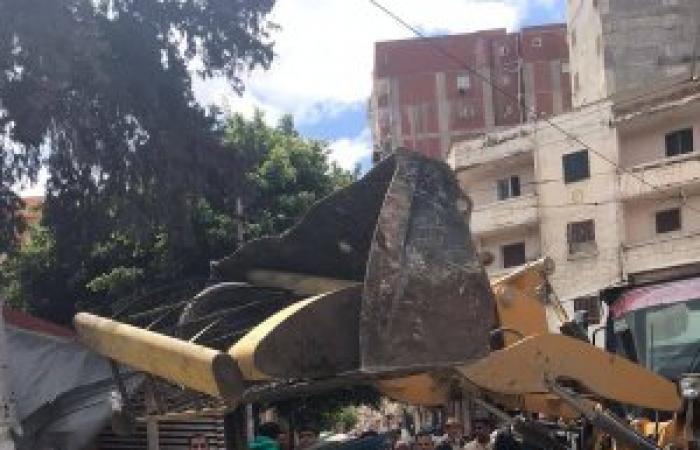 إعادة الانضباط لشارعي الناصر محمد والأمير عمر بالغيط الصعيدي بحي وسط