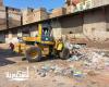 رئيس حي وسط تتابع ميدانيا اعمال رفع المخلفات من شارع المهدي العباسي بغربال